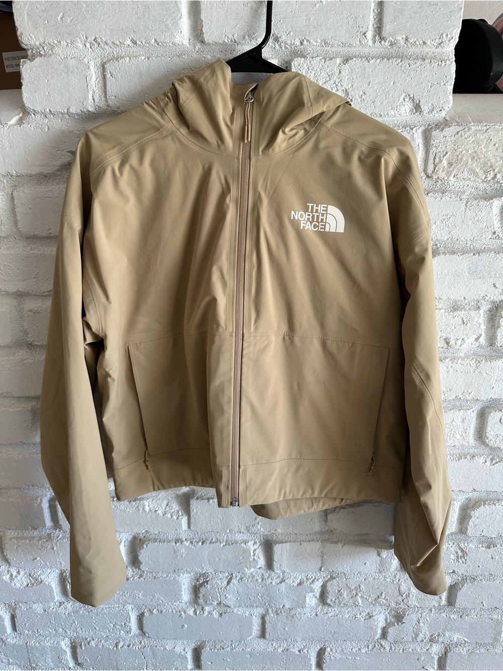 The North Face Men’s Hooded Windbreaker in Beige
